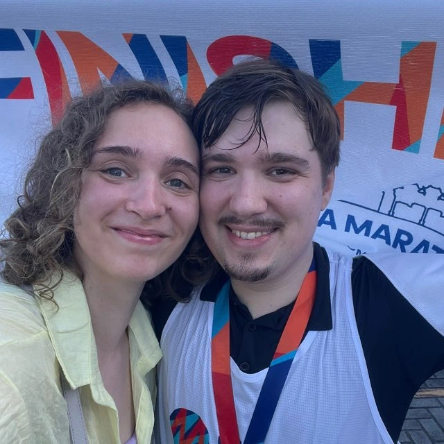 Artem Blazhievskii running with Natalie Blazhievskaia
